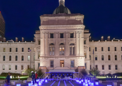 When the water jets are turned off, the still water becomes a reflecting pool showcasing the Statehouse.