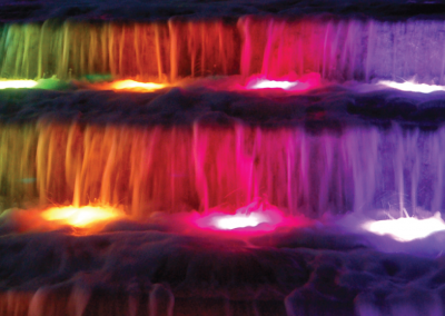 Smale waterfall lit up with LED lighting